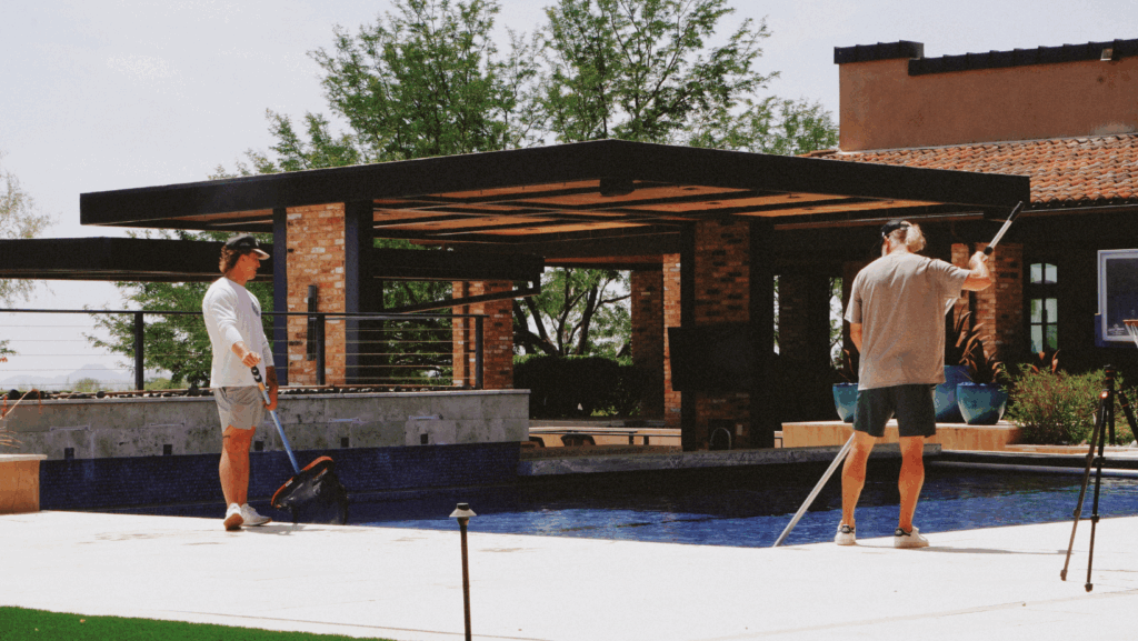 Owner of My Favorite Pool Guy and Technician cleaning a pool in Arizona.